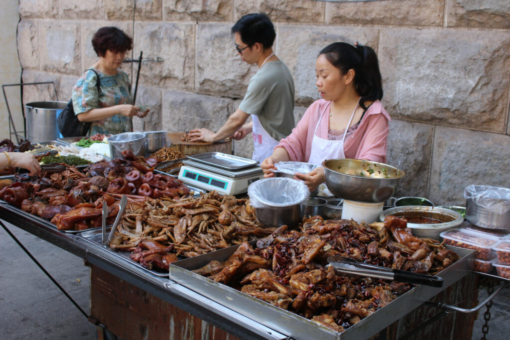 Pig meat products sold at the roadside in Chongqing, China. Photo: Vincent ter Beek